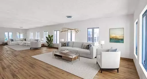 Virtually staged space, after construction, added flooring, wall color, and furniture