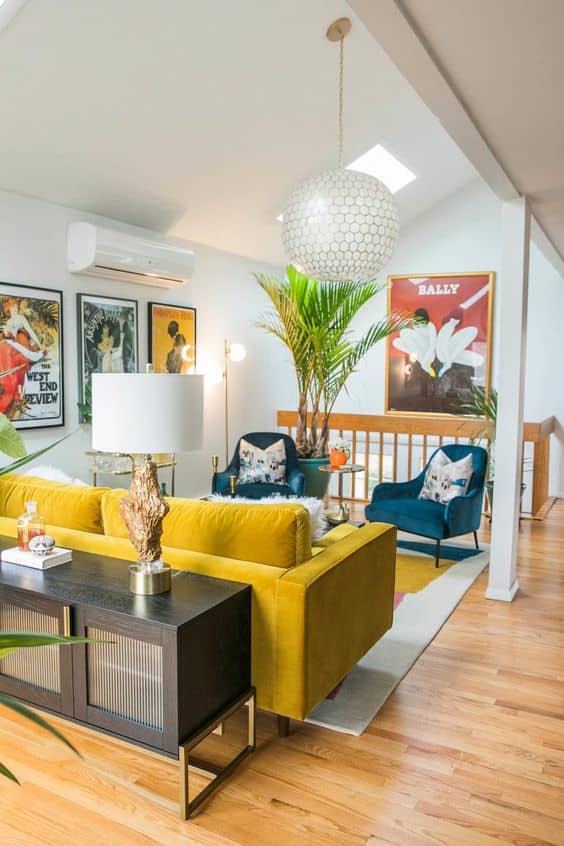 yellow couch in colorful living room