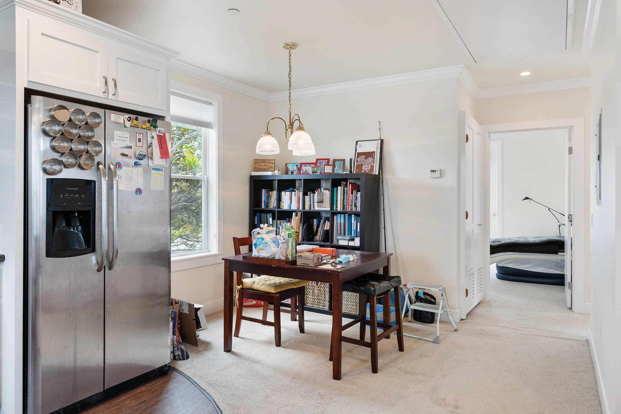 Before and after virtually staged dining room with removed furniture